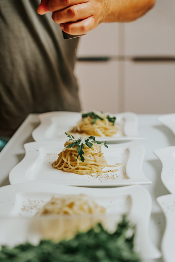 Two pasta dishes prepared for food service